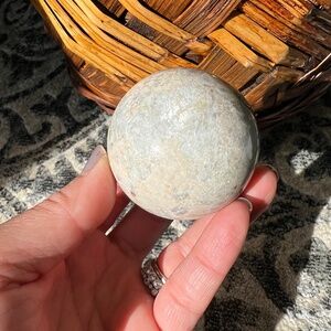 White Luna eurphoralite sphere (uv) | crystal